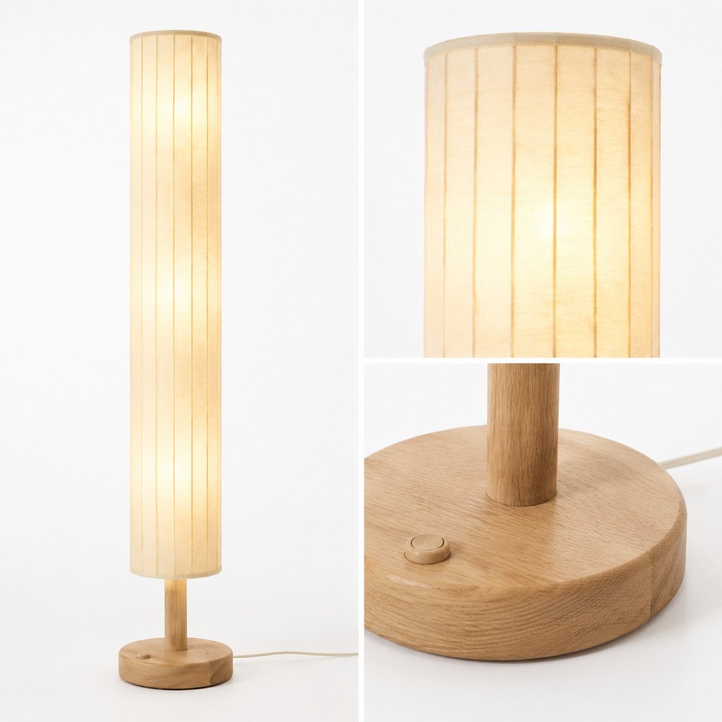 Akari rice-paper floor lamp with oak base glowing warmly in a dim room — view 5